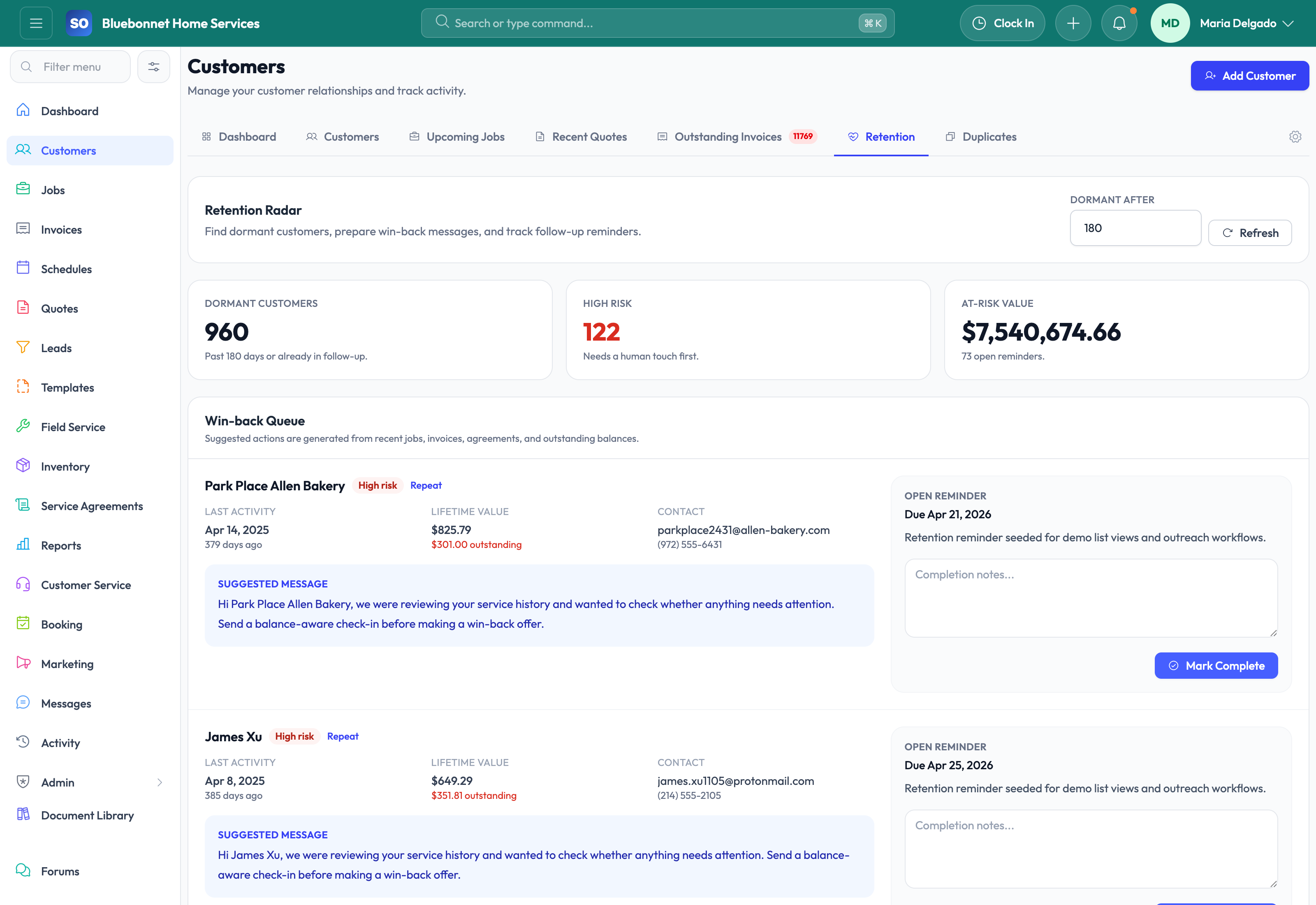Retention tab with repeat-business and churn insights.